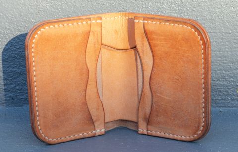 Photo by JewishJesus on March 1, 2026 of the Wild Frontier Goods Frontier Bifold Wallet in Kakishibu Hand Painted Shell Cordovan & Natural Buffed Cowhide.