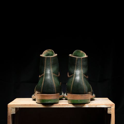 Photo by ScuffedUpKicks on January 6, 2026 of the Iron Boots x Østmo Type 1 in Maryam Dark Green Hand-Dyed Horsehide.