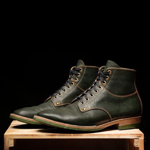 Photo by ScuffedUpKicks on March 6, 2026 of the Iron Boots x Østmo Type 1 in Maryam Dark Green Hand-Dyed Horsehide.