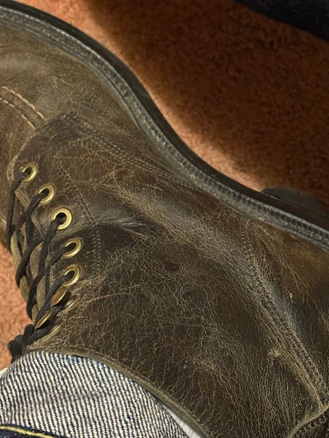 Photo by cabournmallory on December 1, 2025 of the Grant Stone Brass Boot in Black Waxed Deer.