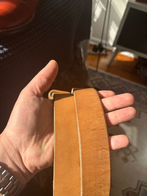 Photo by bootbastard on November 1, 2025 of the Carmine Jack Leather J&FJ Baker Natural Oak Bark Bridle Belts in J&FJ Baker Natural Oak Bark Tanned Harness.
