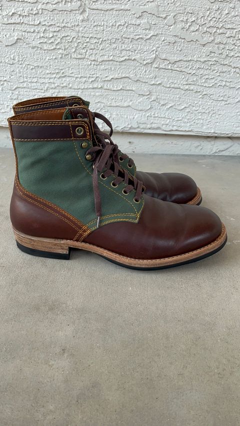 Photo by udi on January 6, 2025 of the Akito Trooper Boots in Veg-tanned, Vintage Brown Hand Finished/12oz Army Green Duck Canvas.