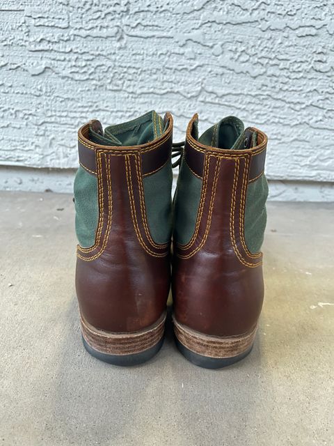 Photo by udi on March 6, 2025 of the Akito Trooper Boots in Veg-tanned, Vintage Brown Hand Finished/12oz Army Green Duck Canvas.