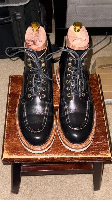 Photo by HeritageWearingPatriot on December 10, 2024 of the Grant Stone Brass Boot in Horween Black Chromexcel.