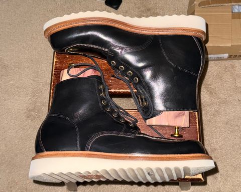 Photo by HeritageWearingPatriot on December 10, 2024 of the Grant Stone Brass Boot in Horween Black Chromexcel.