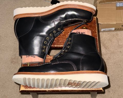 Photo by HeritageWearingPatriot on December 10, 2024 of the Grant Stone Brass Boot in Horween Black Chromexcel.