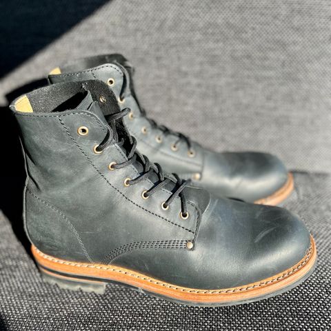 View photo of Urban Shepherd Scout Charcoal in Waxed Portugese Calfskin