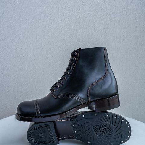 View photo of Nova Boots 40s Munson Combat Boots in Maryam Black Waxed Horsebutt