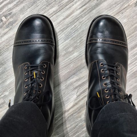 View photo of Nova Boots 40s Munson Combat Boots in Maryam Black Waxed Horsebutt