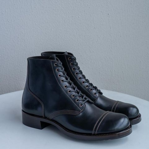 View photo of Nova Boots 40s Munson Combat Boots in Maryam Black Waxed Horsebutt