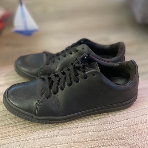 View photo of Thursday Premier Low Top in Black Vachetta