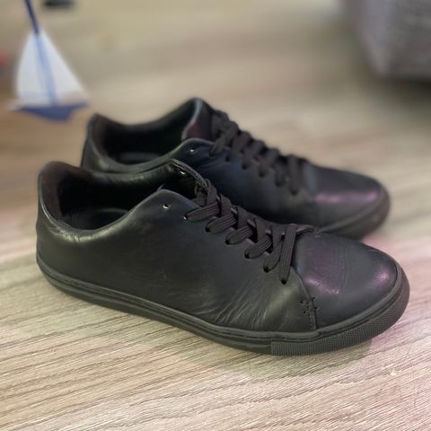 View photo of Thursday Premier Low Top in Black Vachetta