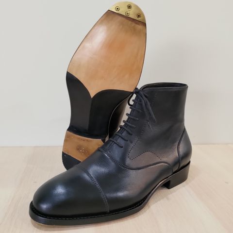 View photo of Patrio Shoemaker Captoe Oxford Boots in Unknown Material