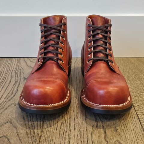 View photo of Iron Boots Pitman in Maryam Brick Red Hand-Dyed Horsehide