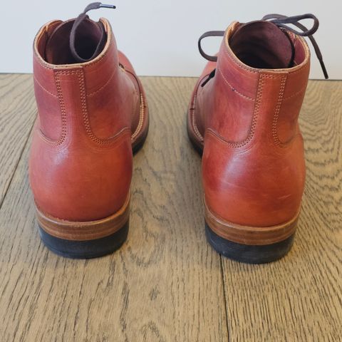 View photo of Iron Boots Pitman in Maryam Brick Red Hand-Dyed Horsehide