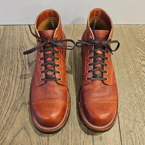 View photo of Iron Boots Pitman in Maryam Brick Red Hand-Dyed Horsehide