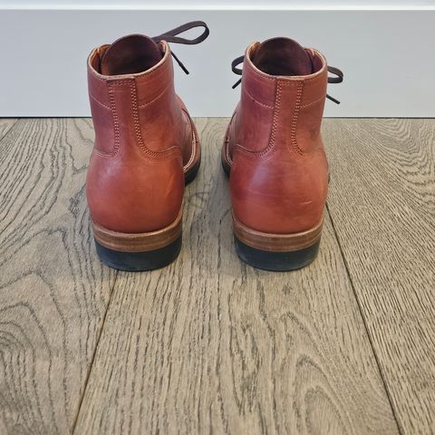 View photo of Iron Boots Pitman in Maryam Brick Red Hand-Dyed Horsehide