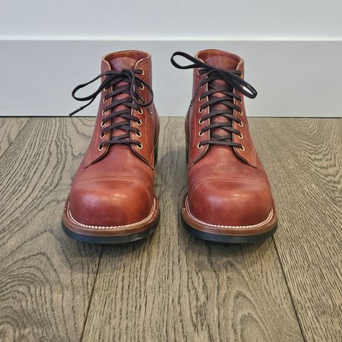 View photo of Iron Boots Pitman in Maryam Brick Red Hand-Dyed Horsehide