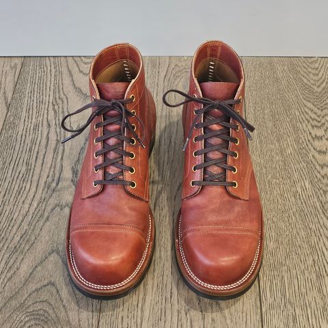 View photo of Iron Boots Pitman in Maryam Brick Red Hand-Dyed Horsehide