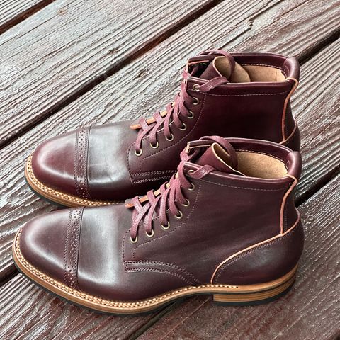 View photo of Flame Panda Brogue Cap Toe Service Boot in Maryam Burgundy-Overdyed Horsebutt