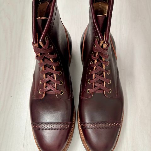 View photo of Flame Panda Brogue Cap Toe Service Boot in Maryam Burgundy-Overdyed Horsebutt