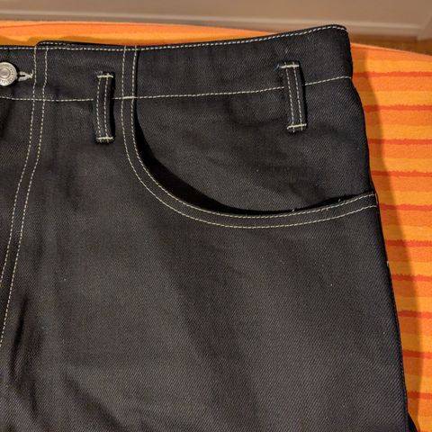 View photo of Luxire Hiroshi Kato Black Overdyed Jeans in 13 Oz