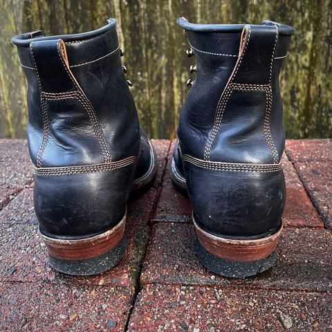 View photo of Quan Shoemaker Unlisted Model in Maryam Black Horsebutt