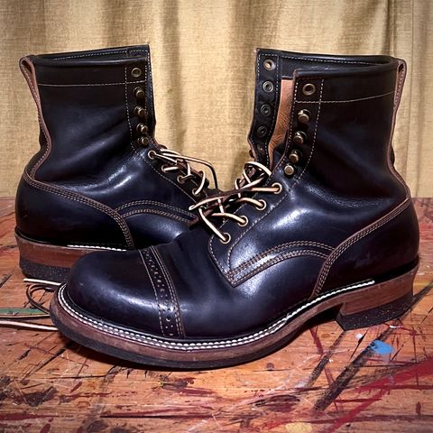 View photo of Quan Shoemaker Unlisted Model in Maryam Black Horsebutt