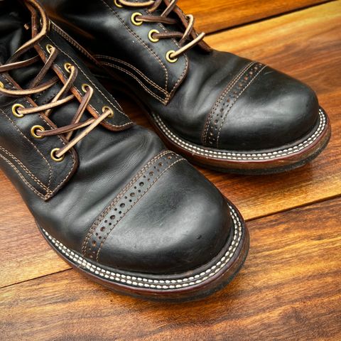 View photo of Quan Shoemaker Unlisted Model in Maryam Black Horsebutt