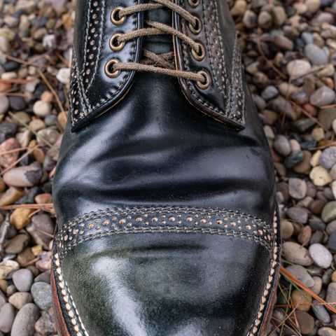 View photo of Flame Panda Brogue Cap Toe Service Boot in Horween Marbled Black Shell Cordovan