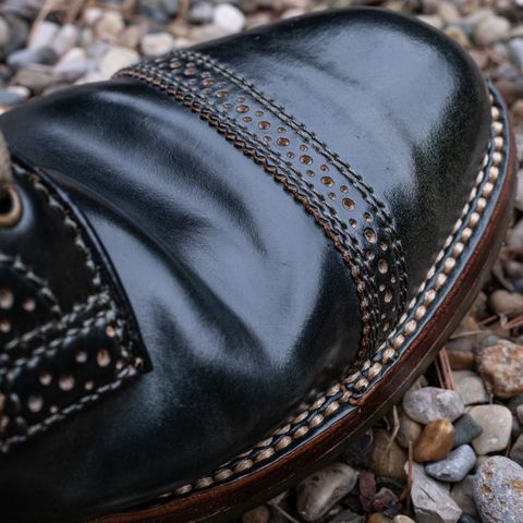 View photo of Flame Panda Brogue Cap Toe Service Boot in Horween Marbled Black Shell Cordovan