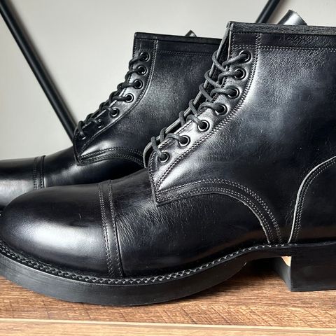 Caswell Garrett in Maryam Black TPR Horsebutt