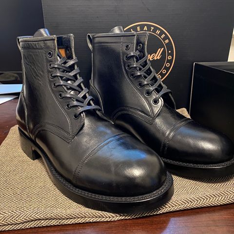 Caswell Garrett in Maryam Black TPR Horsebutt