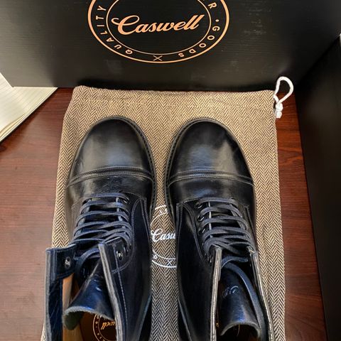 Caswell Garrett in Maryam Black TPR Horsebutt