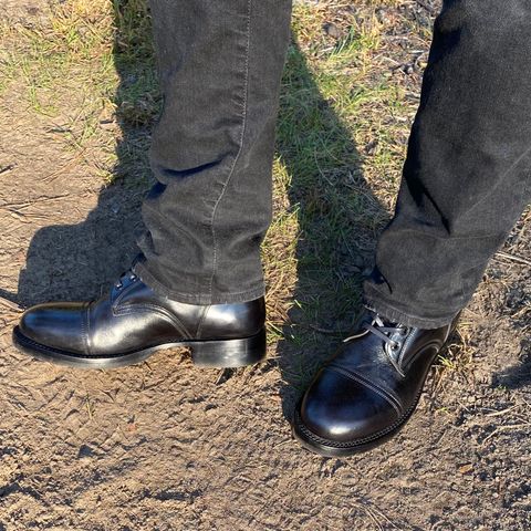 Caswell Garrett in Maryam Black TPR Horsebutt