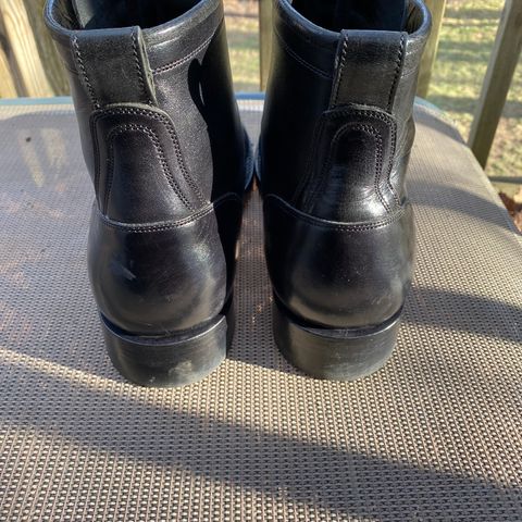 Caswell Garrett in Maryam Black TPR Horsebutt