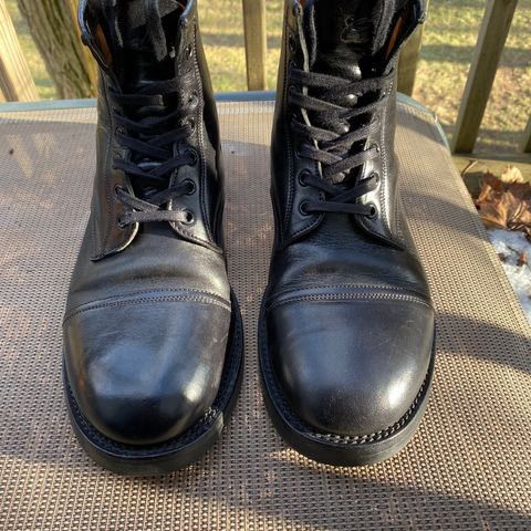Caswell Garrett in Maryam Black TPR Horsebutt