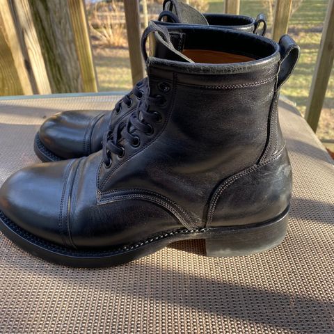 Caswell Garrett in Maryam Black TPR Horsebutt