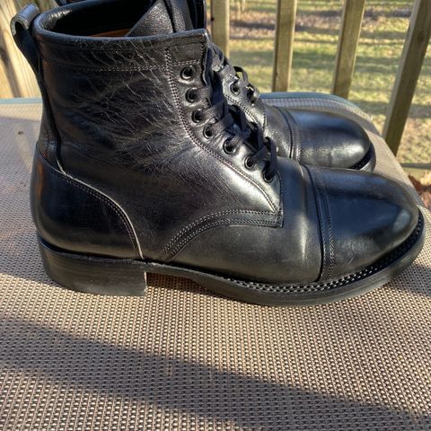 Caswell Garrett in Maryam Black TPR Horsebutt